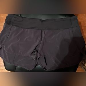 Women’s like new Lululemon running shorts.